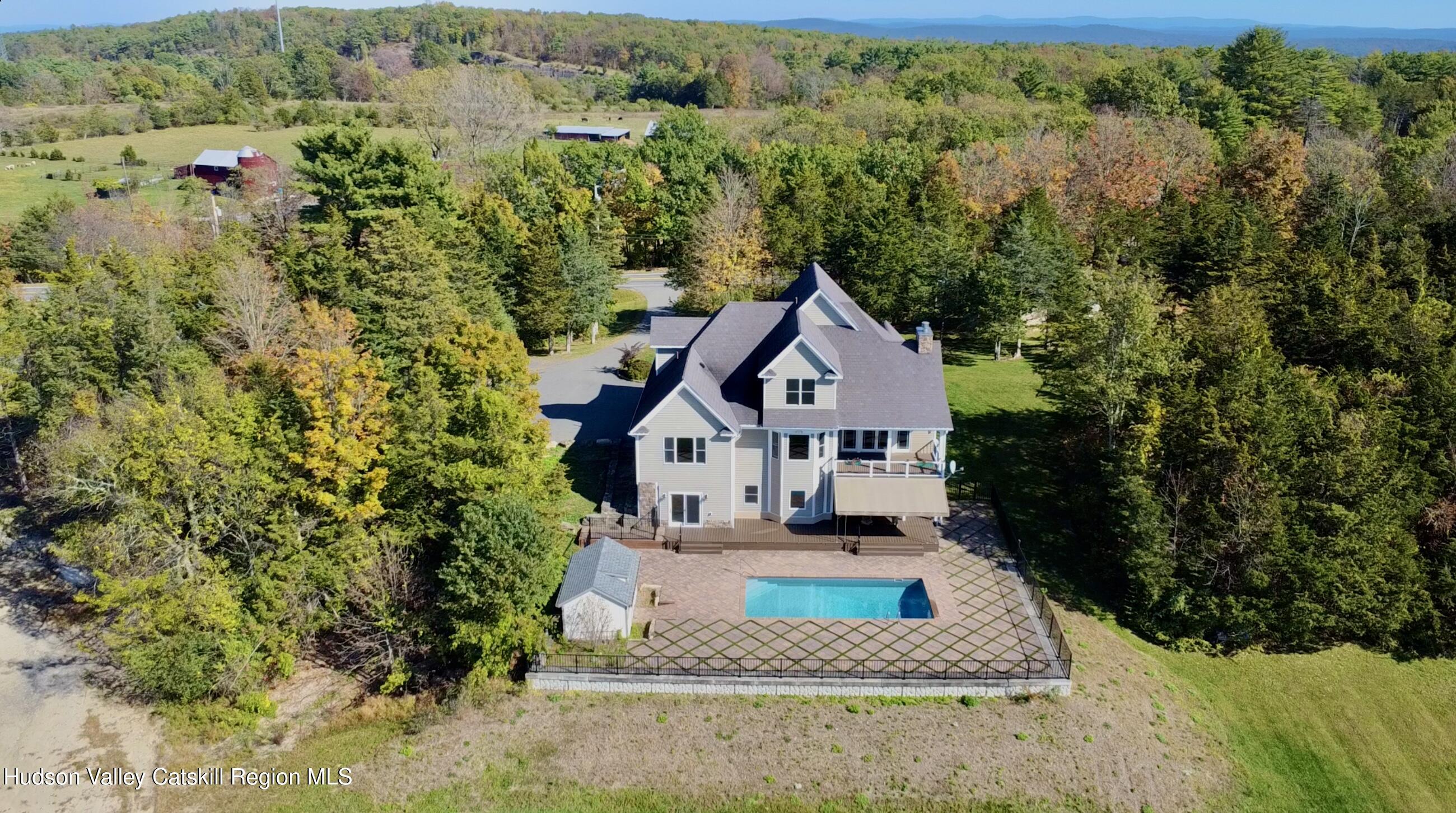 3071 Old Kings Road Catskill, NY 12414 - Photo 3 of 53 a view of a house with a small yard plants and large tree