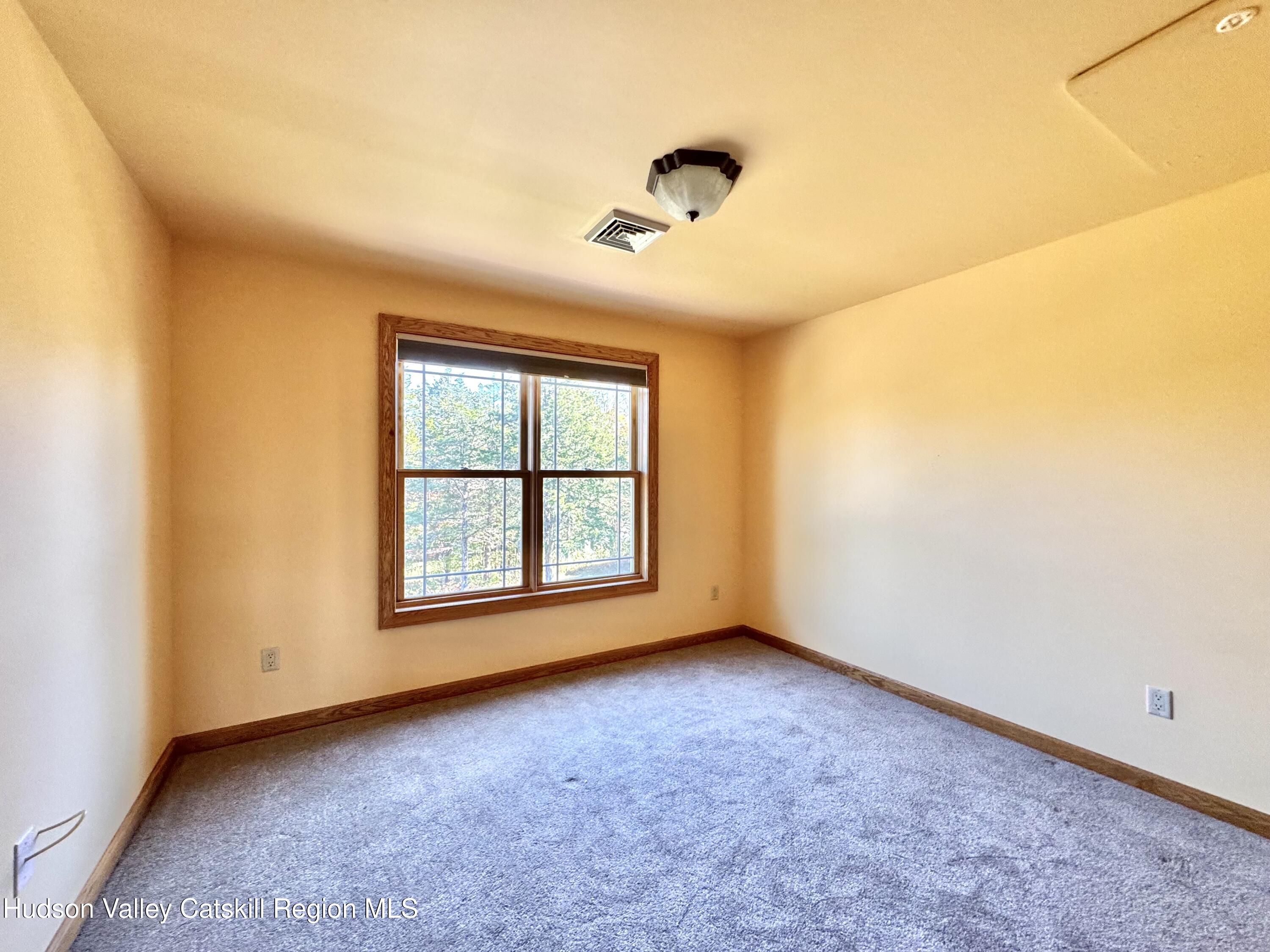 3071 Old Kings Road Catskill, NY 12414 - Photo 35 of 53 an empty room with a window