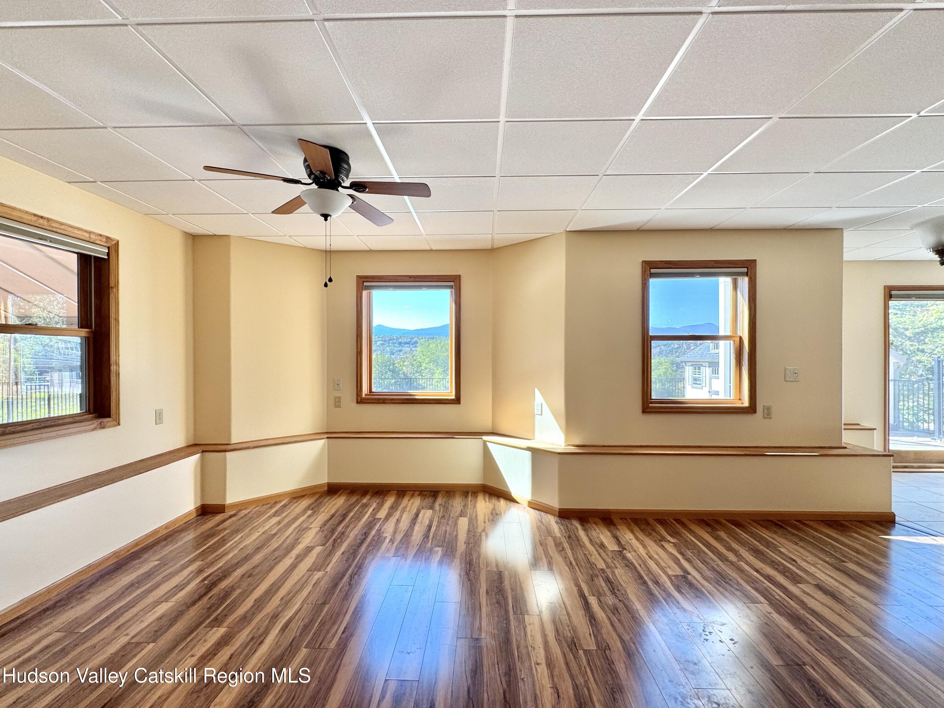 3071 Old Kings Road Catskill, NY 12414 - Photo 43 of 53 a view of empty room with wooden floor and fan