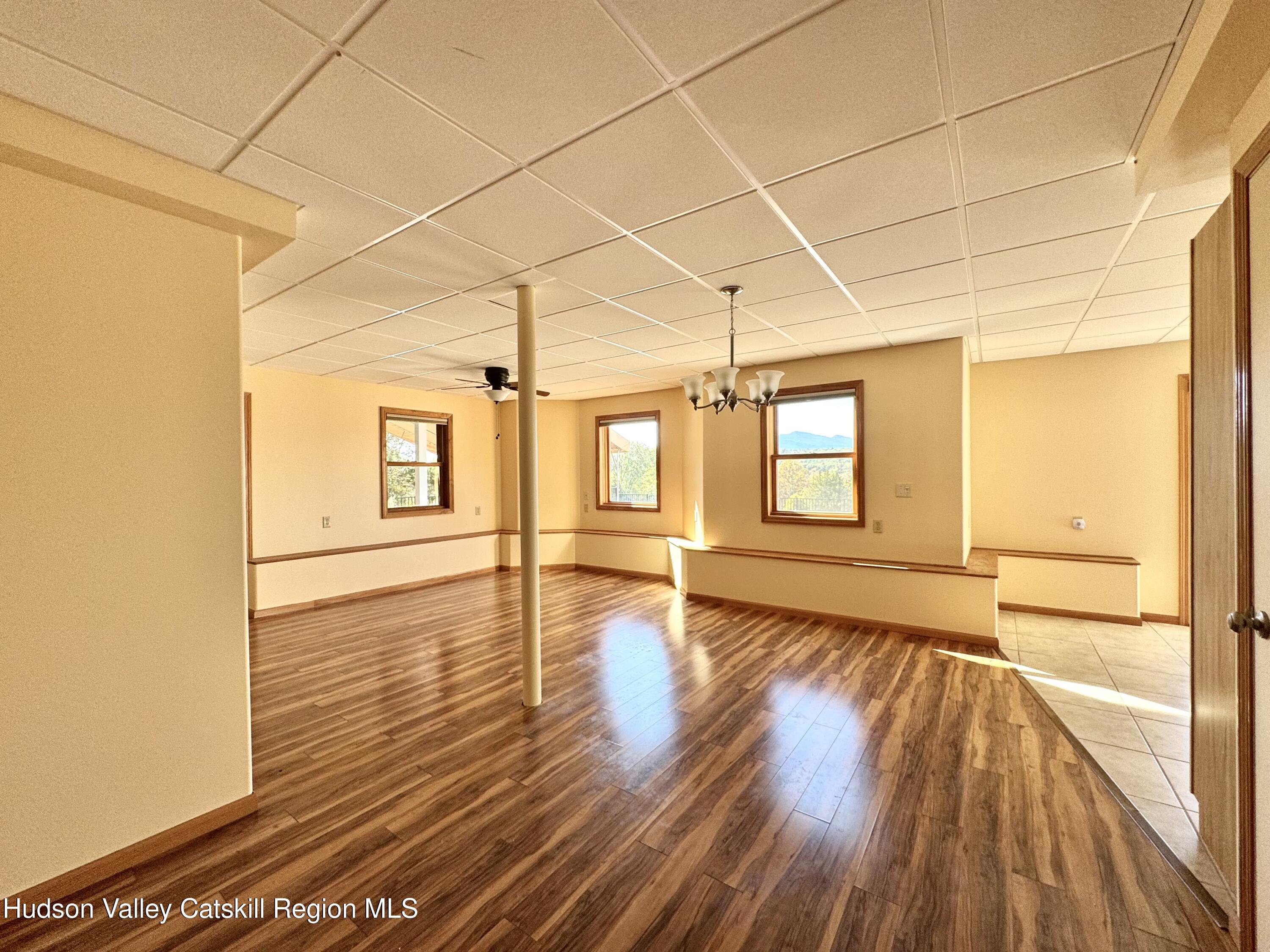 3071 Old Kings Road Catskill, NY 12414 - Photo 44 of 53 a view of an empty room with wooden floor and a window