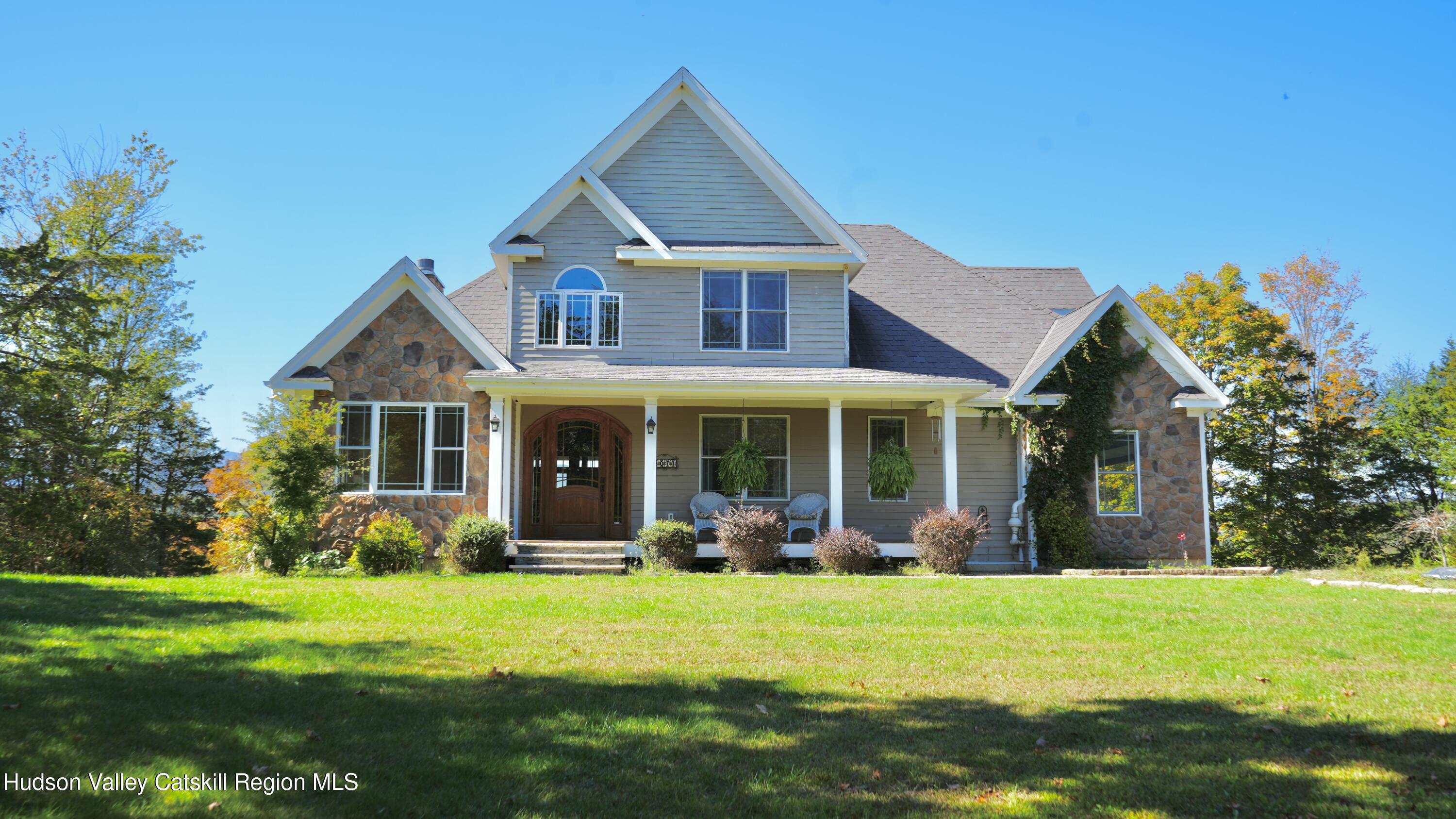 3071 Old Kings Road Catskill, NY 12414 - Photo 5 of 53 a front view of a house with garden