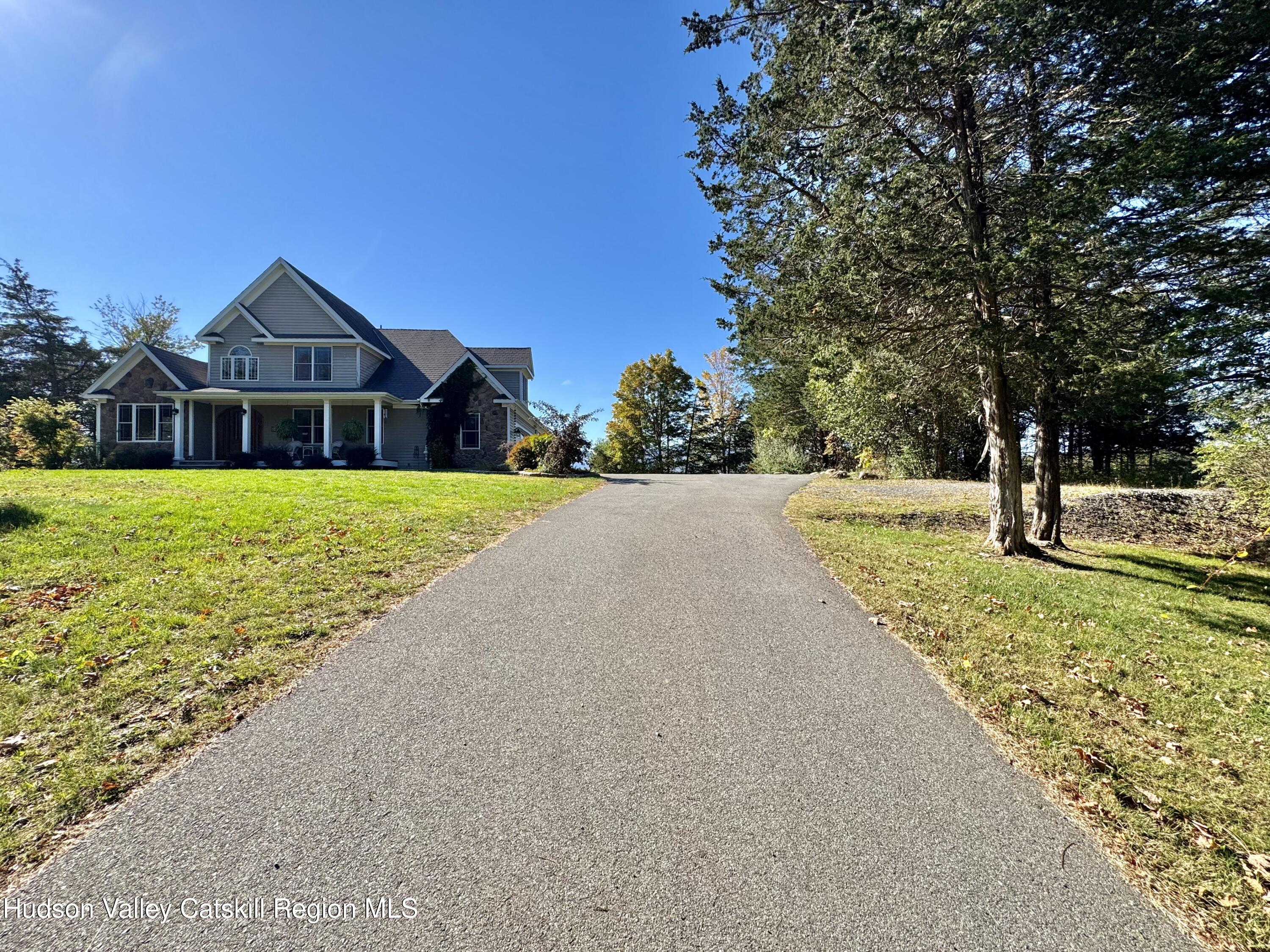 3071 Old Kings Road Catskill, NY 12414 - Photo 10 of 53 a front view of a house with a yard