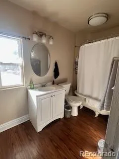 a kitchen with a sink and a mirror