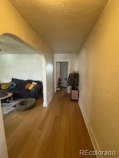 a bed room with a bed and a lamp