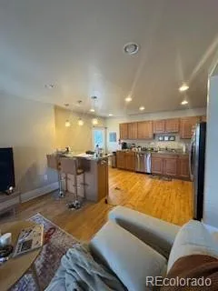 a living room with furniture and a table