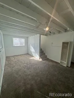 en empty room with windows