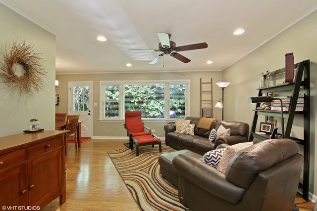 1528 Sunset Ridge Road Glenview, IL 60025 - Photo 2 of 11 a living room with furniture and a flat screen tv