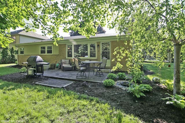 1528 Sunset Ridge Road Glenview, IL 60025 - Photo 11 of 11 a view of a house with backyard sitting area and garden