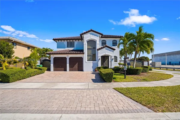 a front view of a house with entertaining space