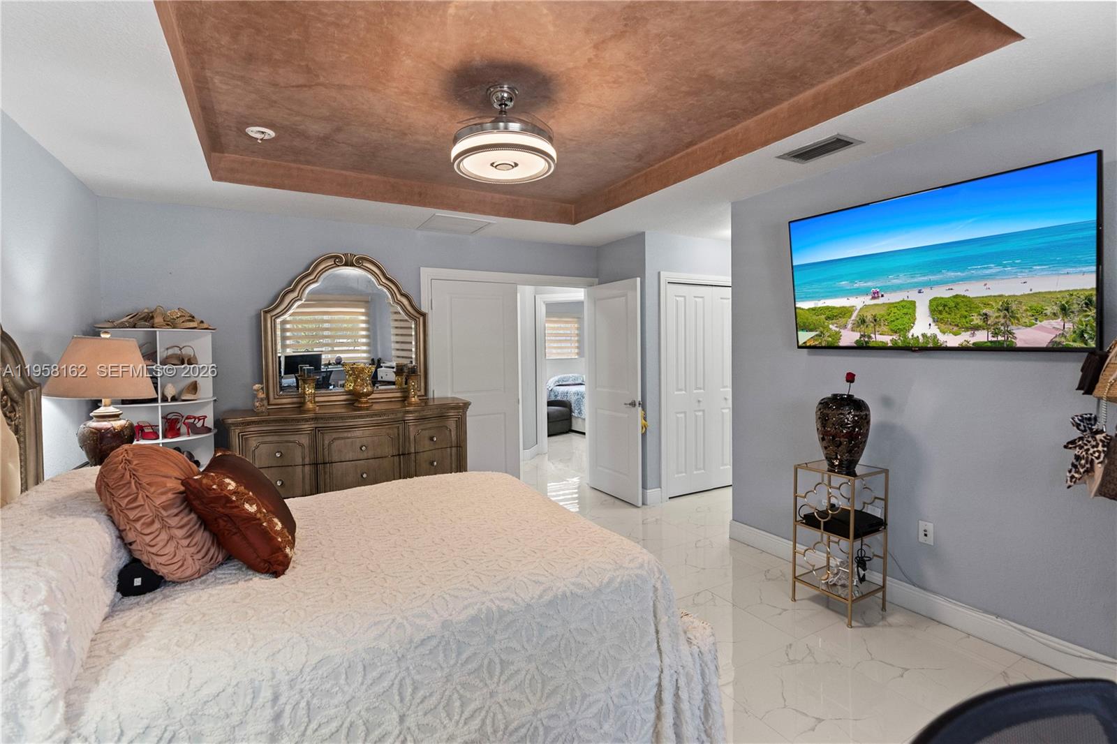 3281 Southwest 145th Avenue Miami, FL 33175 - Photo 39 of 56 a bedroom with a bed and furniture