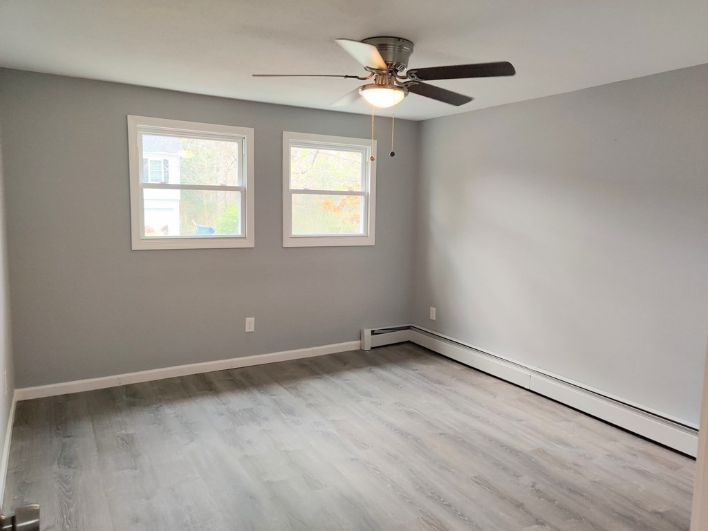 173 Wrentham Road Springfield, MA 01119 - Photo 10 of 15 a view of an empty room with a window