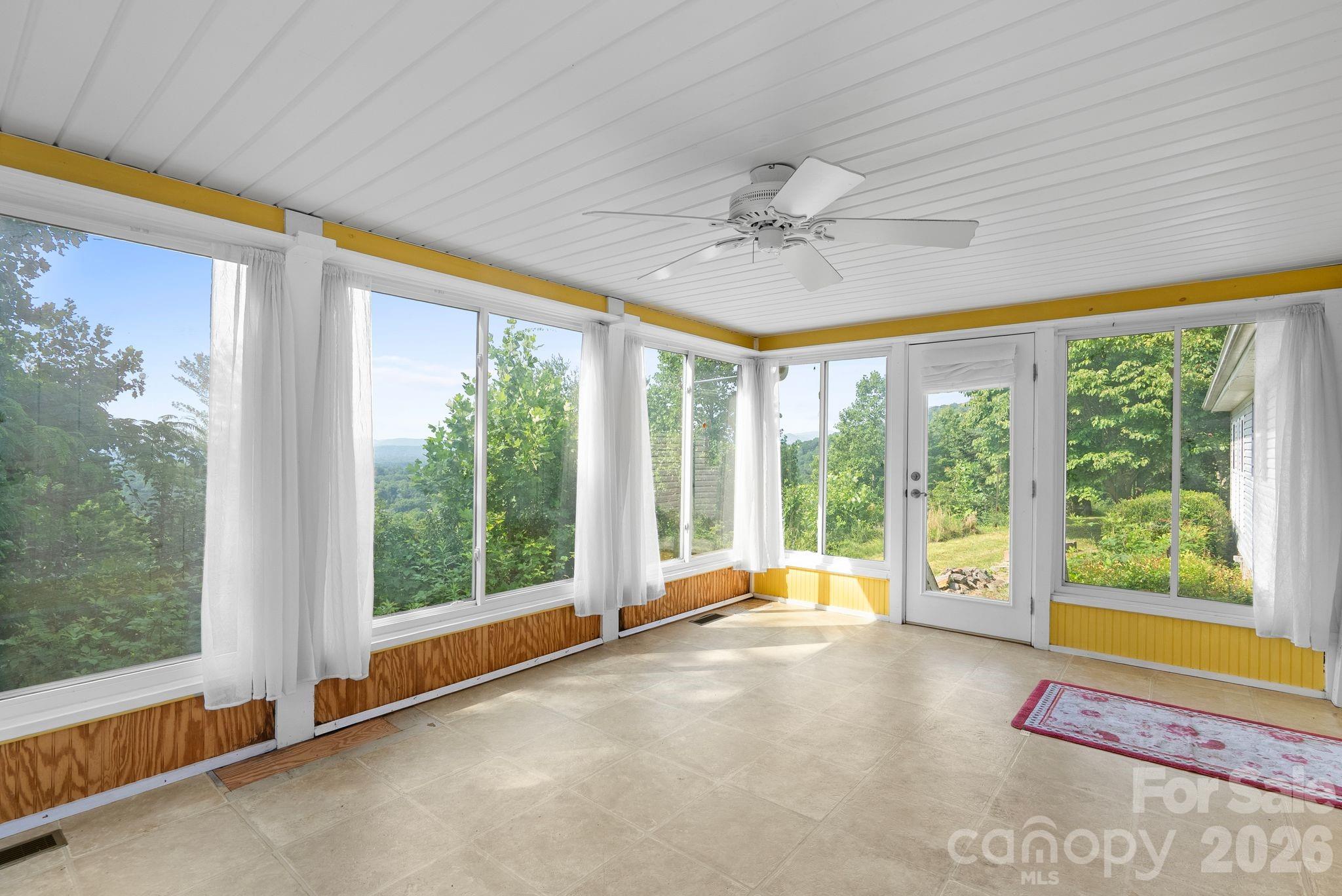 133 Spivey Mountain Road Asheville, NC 28806 - Photo 19 of 40 a view of an empty room with a window