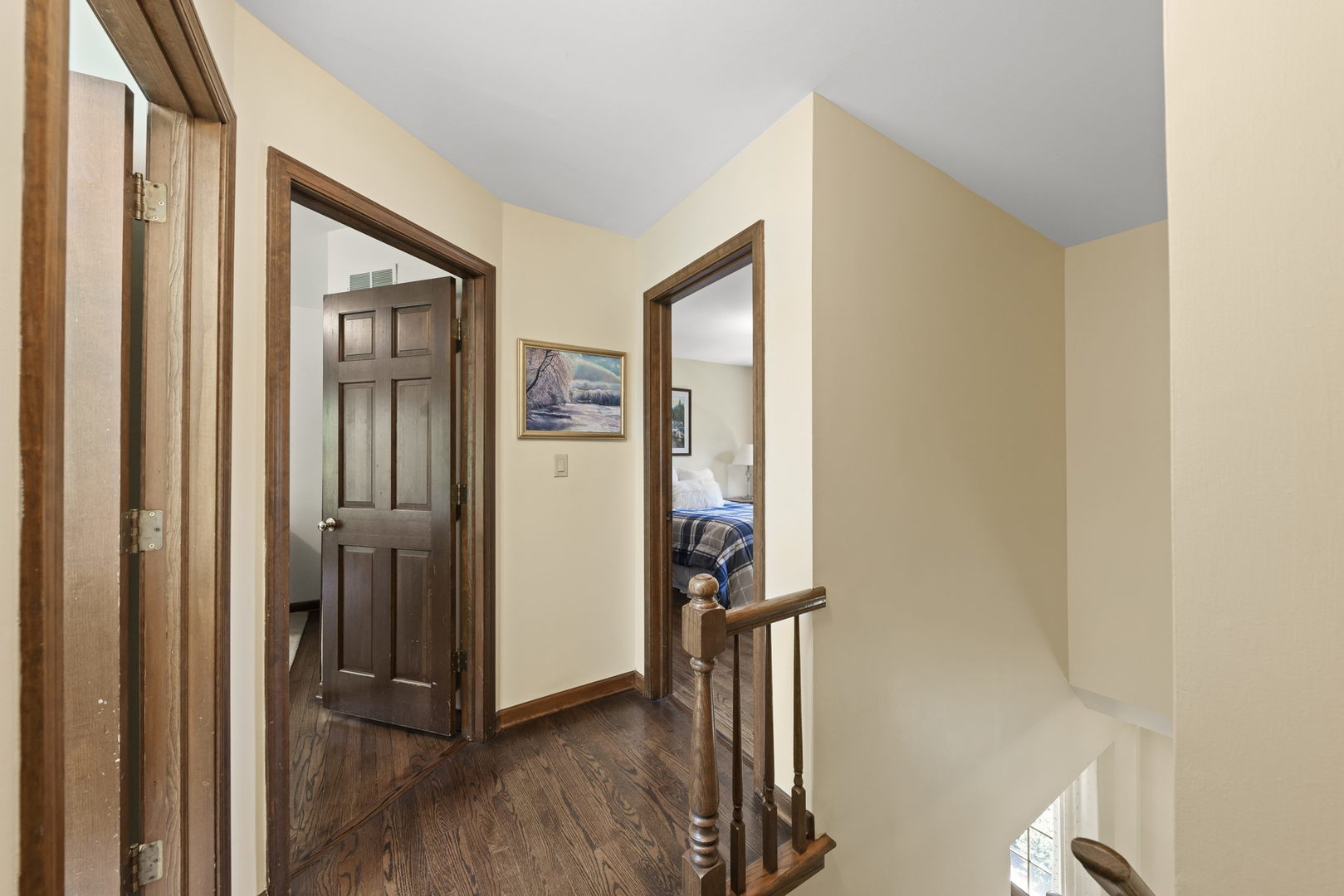 2037 Burnham Place Wheaton, IL 60189 - Photo 17 of 46 a view of a hallway with wooden floor and staircase