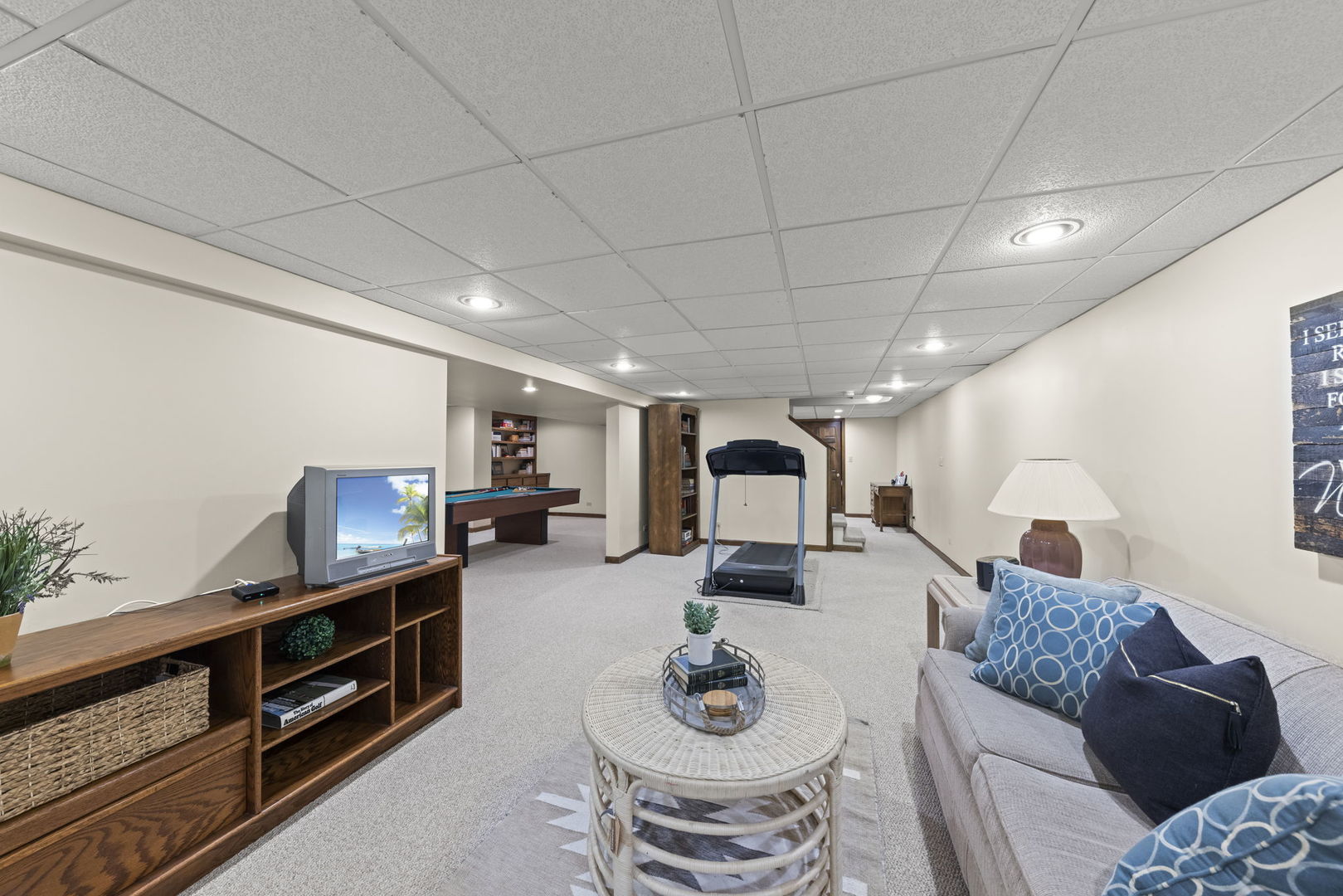 2037 Burnham Place Wheaton, IL 60189 - Photo 34 of 46 a living room with furniture and a flat screen tv