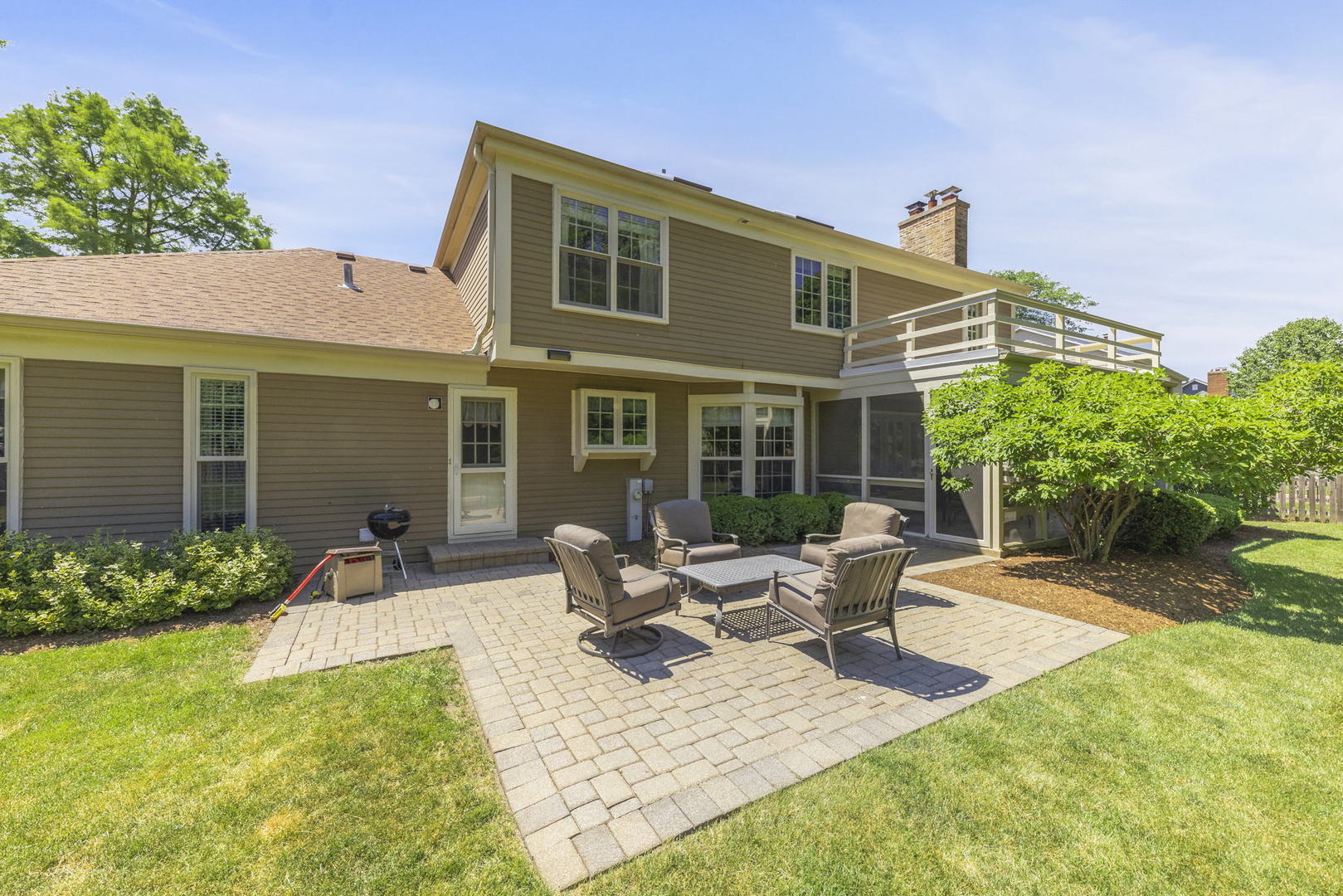 2037 Burnham Place Wheaton, IL 60189 - Photo 41 of 46 a view of a house with backyard sitting area and garden