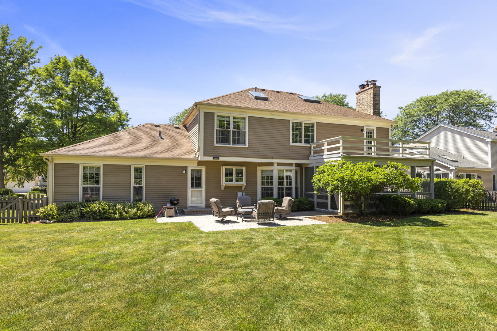 2037 Burnham Place Wheaton, IL 60189 - Photo 44 of 46 a front view of a house with garden