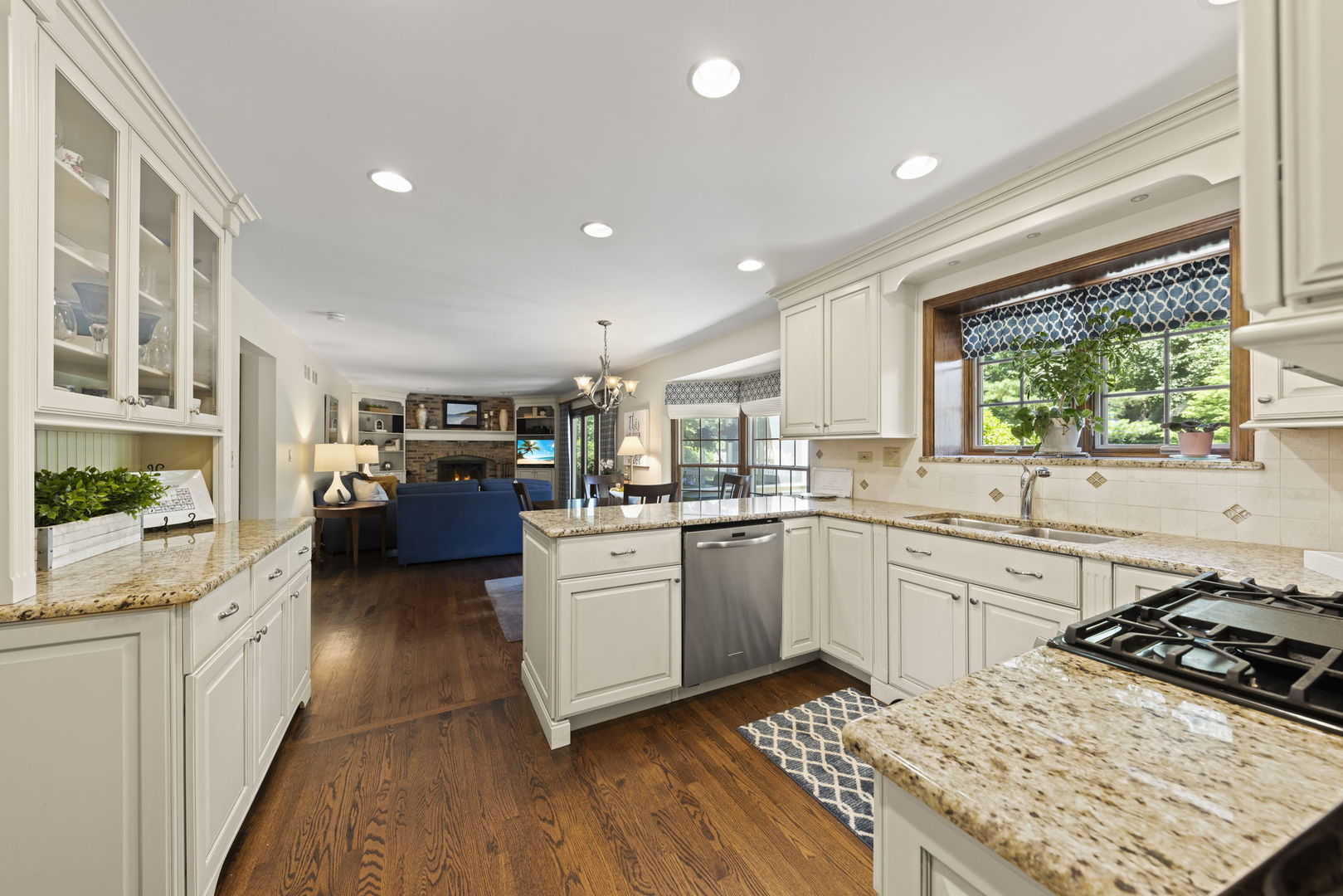 2037 Burnham Place Wheaton, IL 60189 - Photo 5 of 46 a kitchen with stove a sink and cabinets