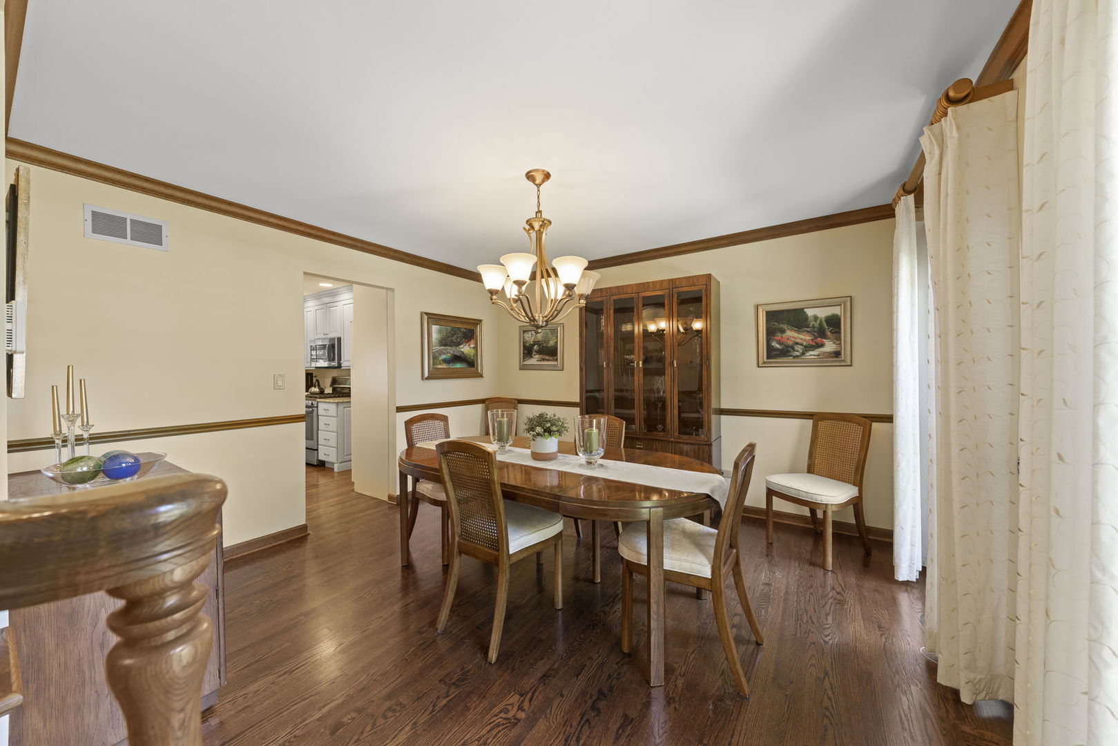2037 Burnham Place Wheaton, IL 60189 - Photo 8 of 46 a view of a dining room with furniture and wooden floor