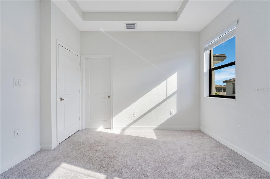 28517 Southwest 134th Avenue Homestead, FL 33033 - Photo 12 of 34 a view of an empty room with stairs