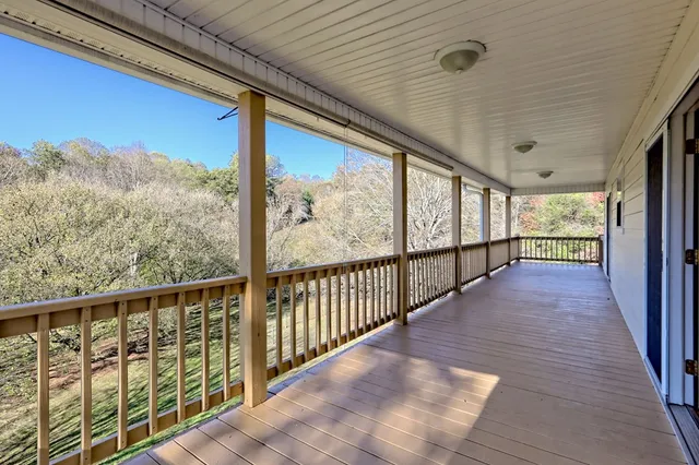 a view of livingroom with window and a ceiling fan