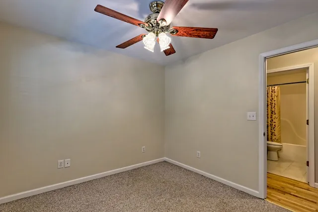 a bathroom with a sink a vanity and a mirror