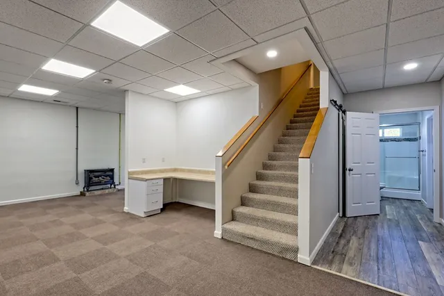 a view of outdoor space with deck and trees