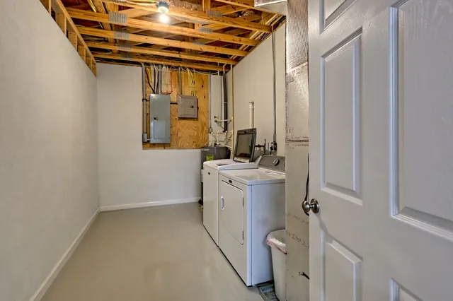 a view of yard with large trees