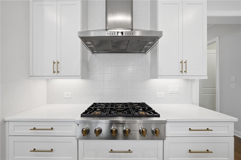 250 Idylwilde Way Canton, GA 30115 - Photo 14 of 59 a stove top oven sitting inside of a kitchen