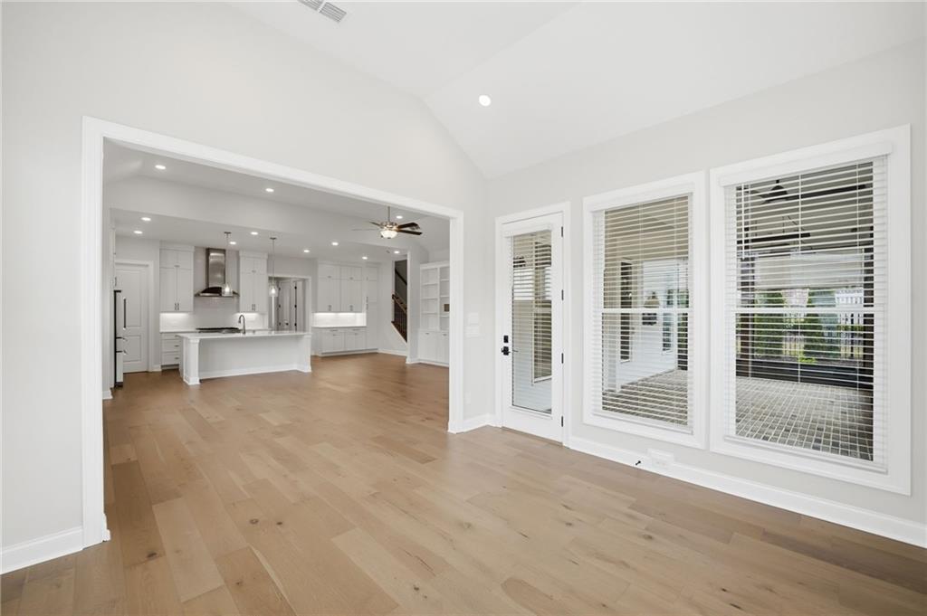 250 Idylwilde Way Canton, GA 30115 - Photo 27 of 59 a view of a big room with wooden floor and windows