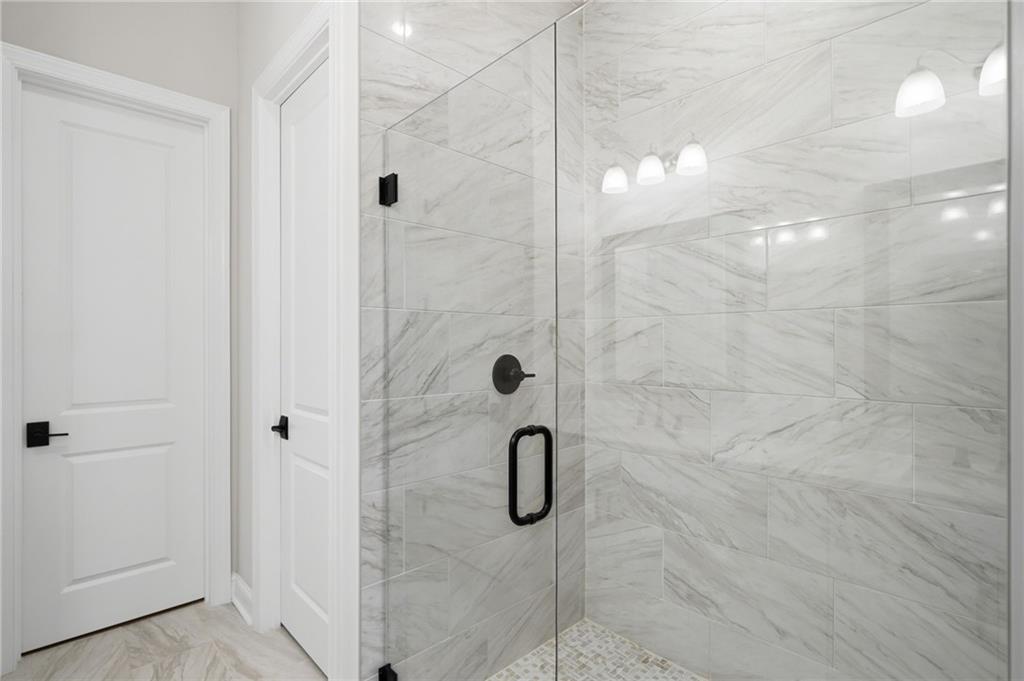 250 Idylwilde Way Canton, GA 30115 - Photo 33 of 59 a bathroom with a shower