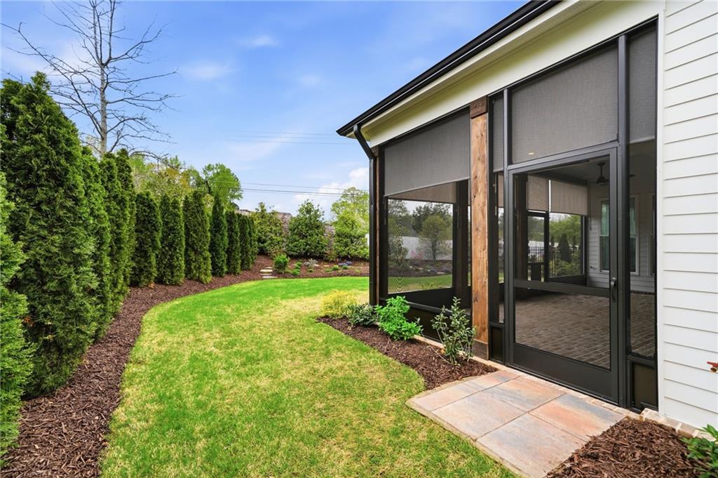 250 Idylwilde Way Canton, GA 30115 - Photo 45 of 59 a front view of a house with garden