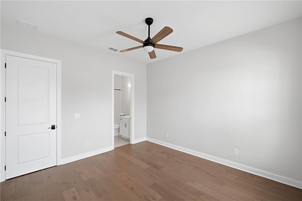 250 Idylwilde Way Canton, GA 30115 - Photo 6 of 59 wooden floor in an empty room