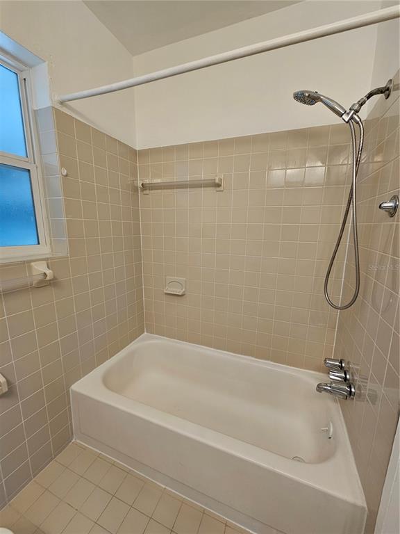 49 Azalea Drive DeBary, FL 32713 - Photo 13 of 25 a bathroom with a bath tub with a shower