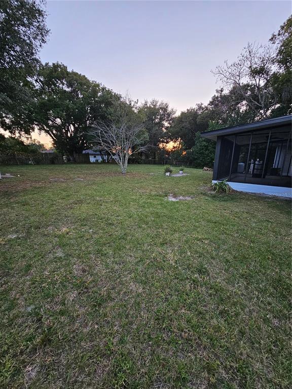 49 Azalea Drive DeBary, FL 32713 - Photo 23 of 25 a view of a house with a yard