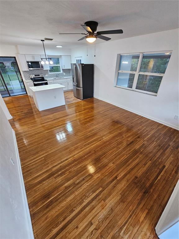 49 Azalea Drive DeBary, FL 32713 - Photo 5 of 25 a view of kitchen with cabinets