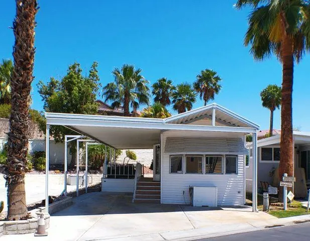 a front view of a house with a porch