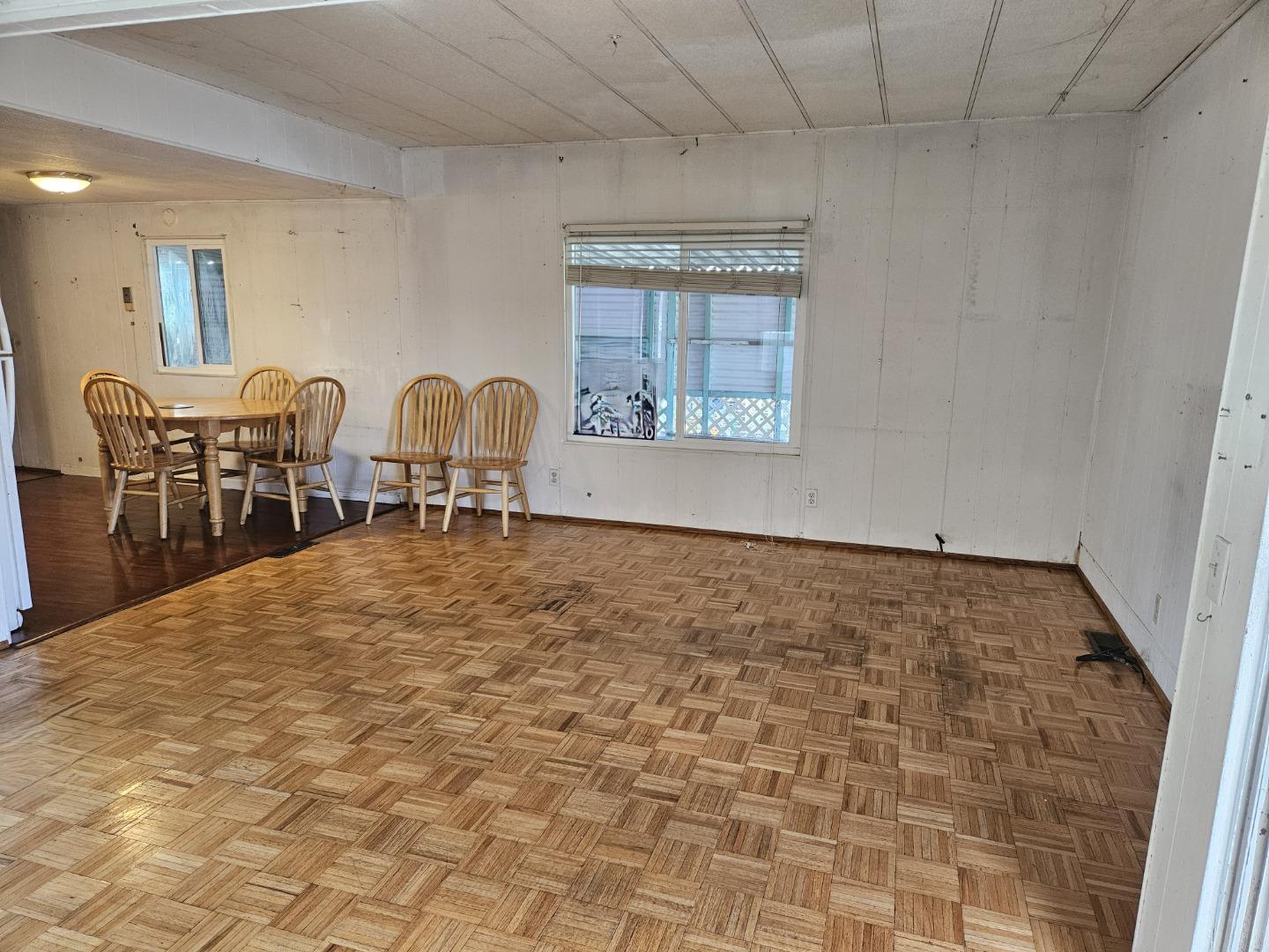 60 Wilson Way, Unit 104 Milpitas, CA 95035 - Photo 3 of 8 a room with chairs and view of kitchen