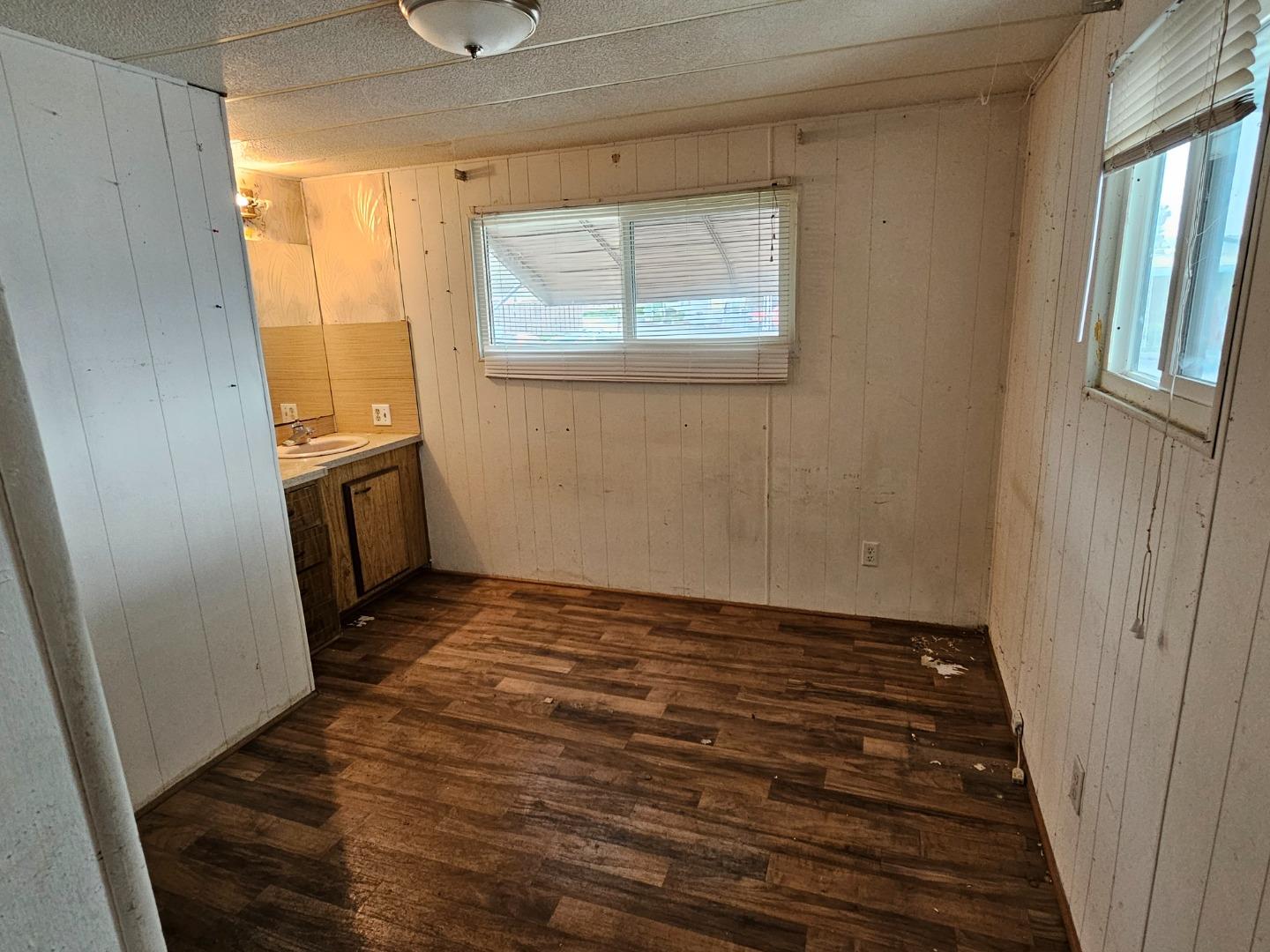 60 Wilson Way, Unit 104 Milpitas, CA 95035 - Photo 5 of 8 an empty room with windows