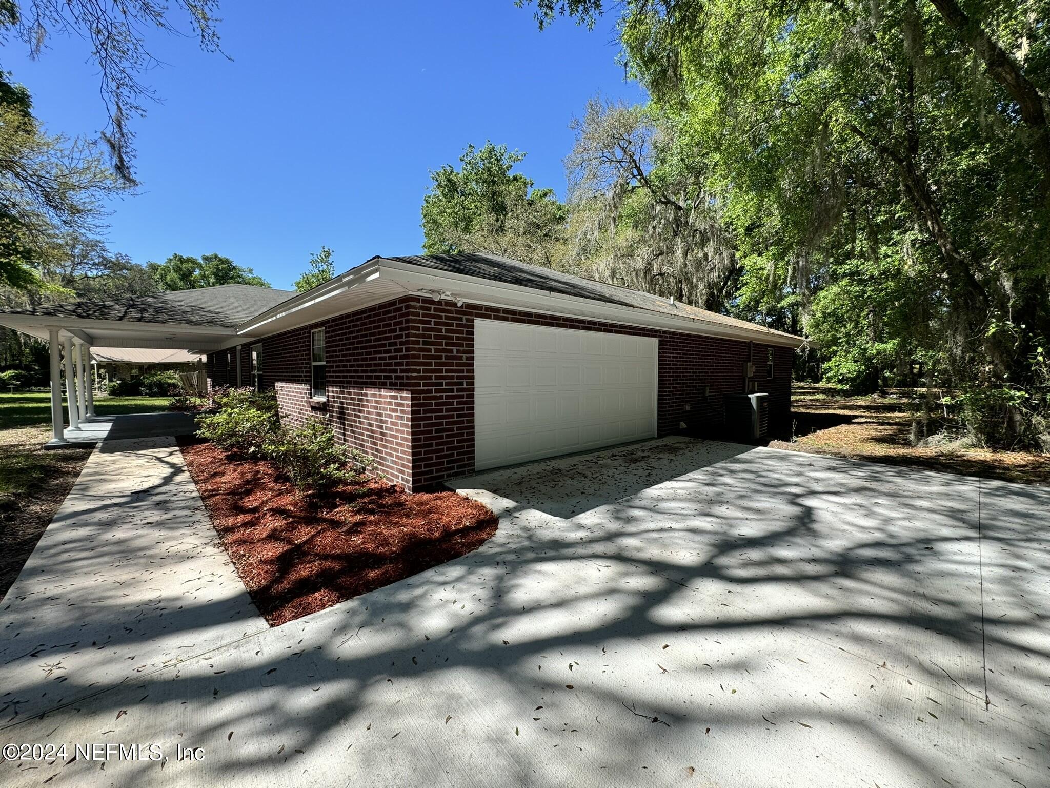 3332 Gay Road Orange Park, FL 32065 - Photo 2 of 29 2 Side Entry Garage