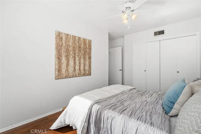 a bathroom with a double vanity sink a mirror and shower