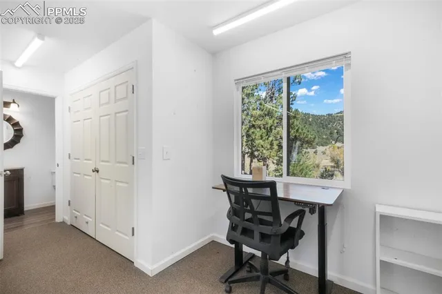 a bathroom with a toilet and a sink