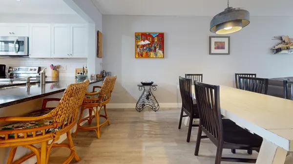 a view of a dining room with furniture