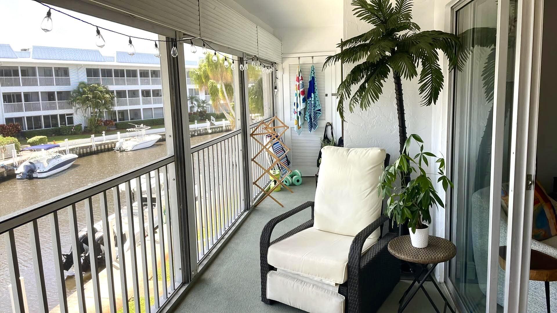1856 Southwest Palm City Road, Unit 203 Stuart, FL 34994 - Photo 7 of 22 a view of balcony with a potted plant