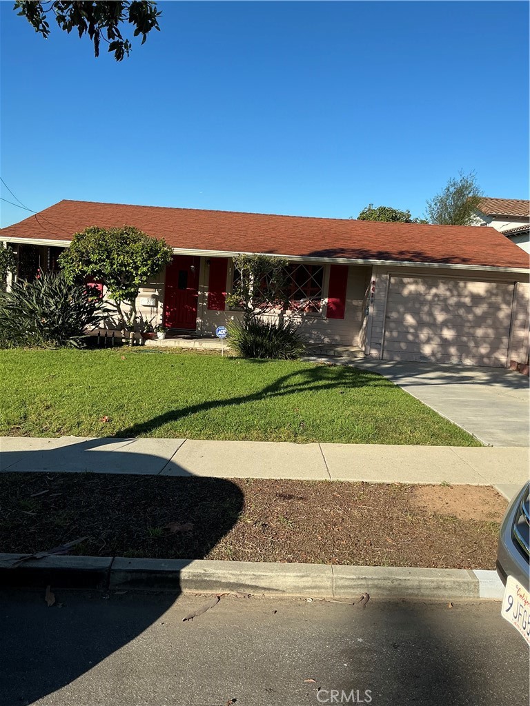 841 Virginia Street El Segundo, CA 90245 - Photo 2 of 7 a view of a street with a building in the background