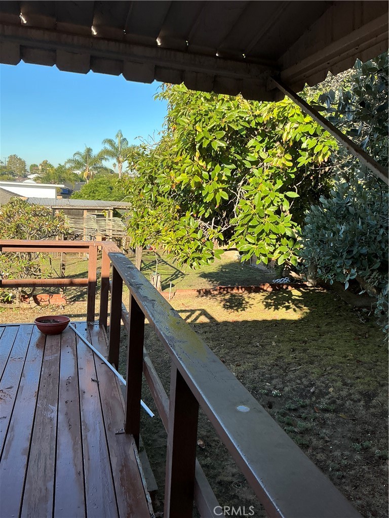 841 Virginia Street El Segundo, CA 90245 - Photo 4 of 7 a view of a balcony with wooden floor and outdoor seating
