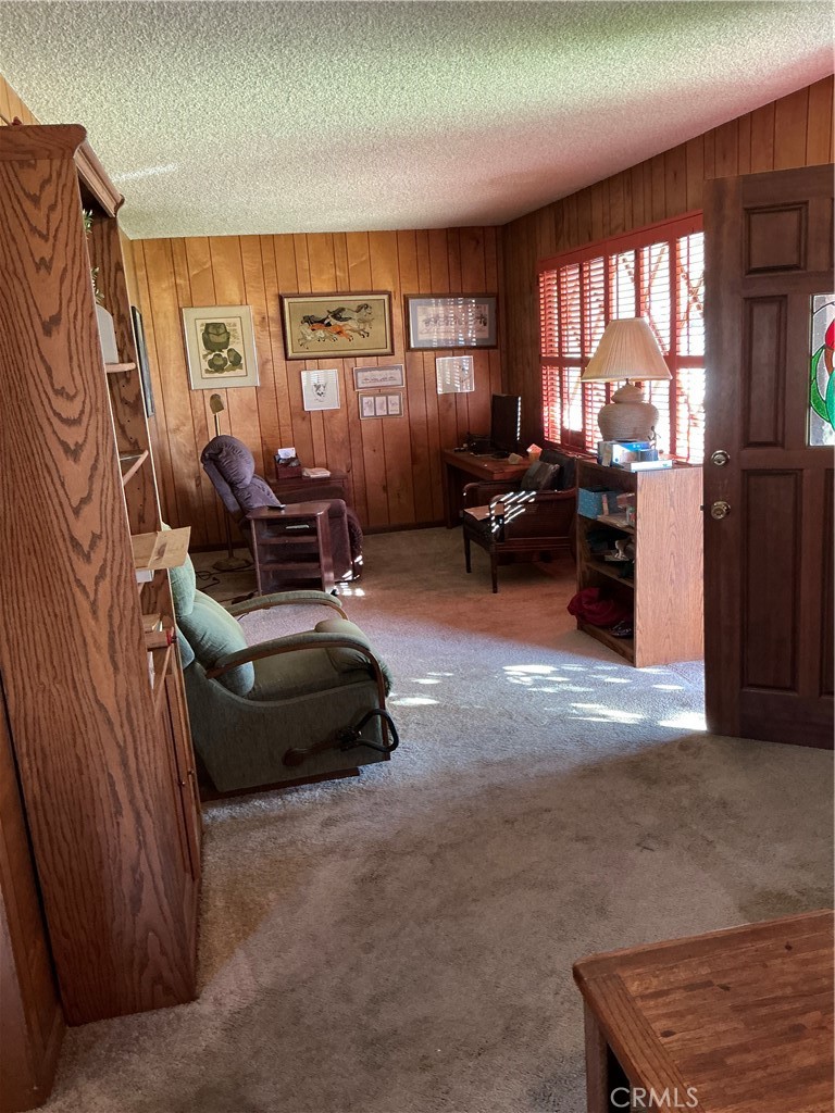 841 Virginia Street El Segundo, CA 90245 - Photo 6 of 7 a living room with furniture and a large window