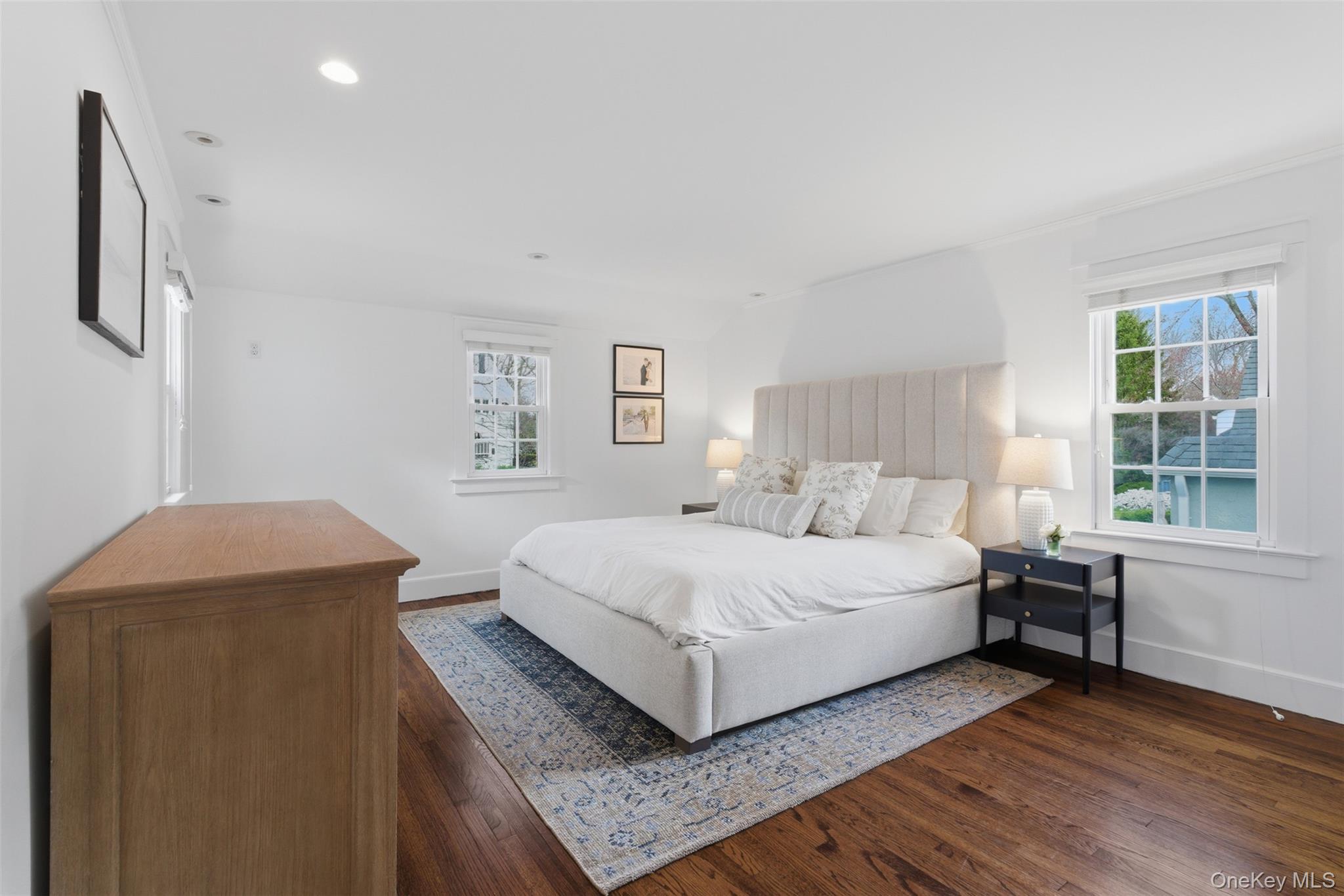32 Kingsbury Road New Rochelle, NY 10804 - Photo 12 of 31 a bedroom with a bed and a large window