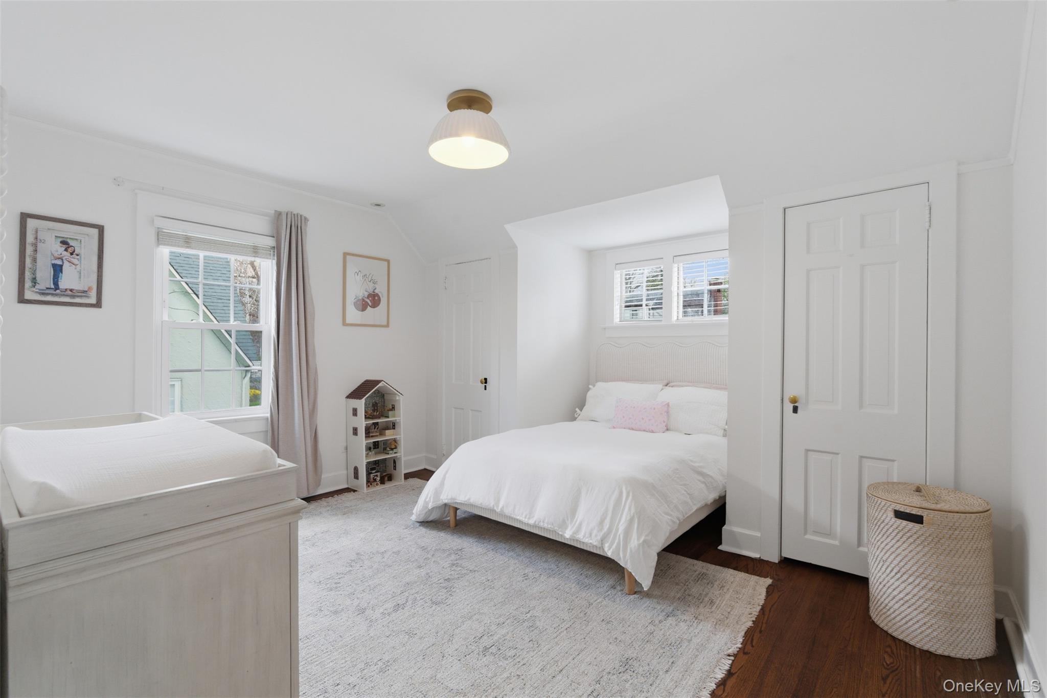 32 Kingsbury Road New Rochelle, NY 10804 - Photo 14 of 31 a bedroom with a bed and a window