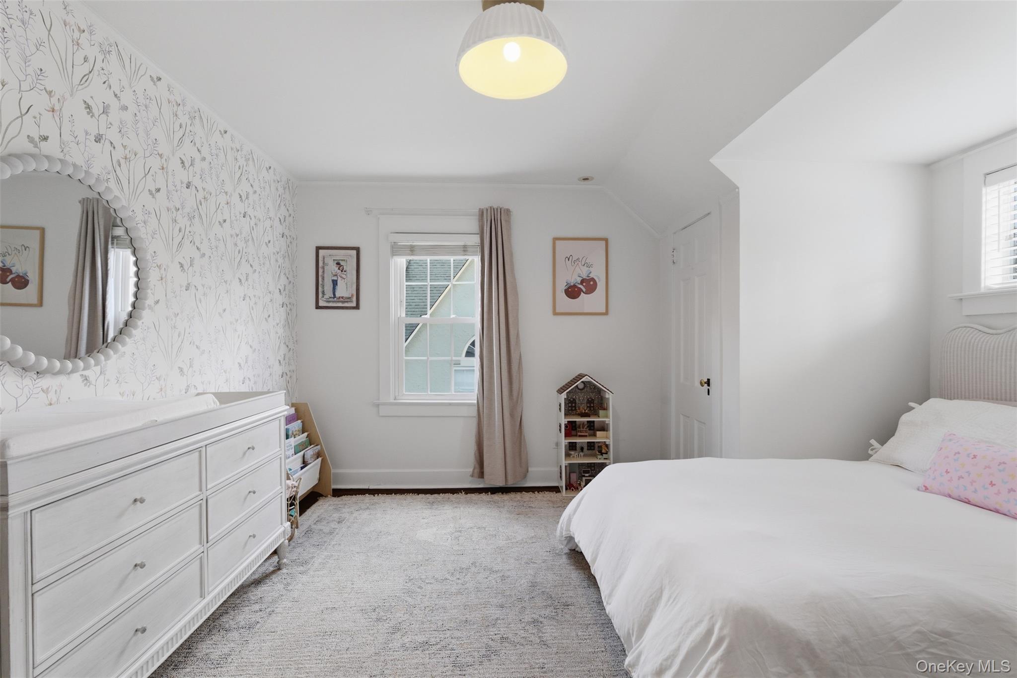 32 Kingsbury Road New Rochelle, NY 10804 - Photo 15 of 31 a bedroom with a bed and a dresser