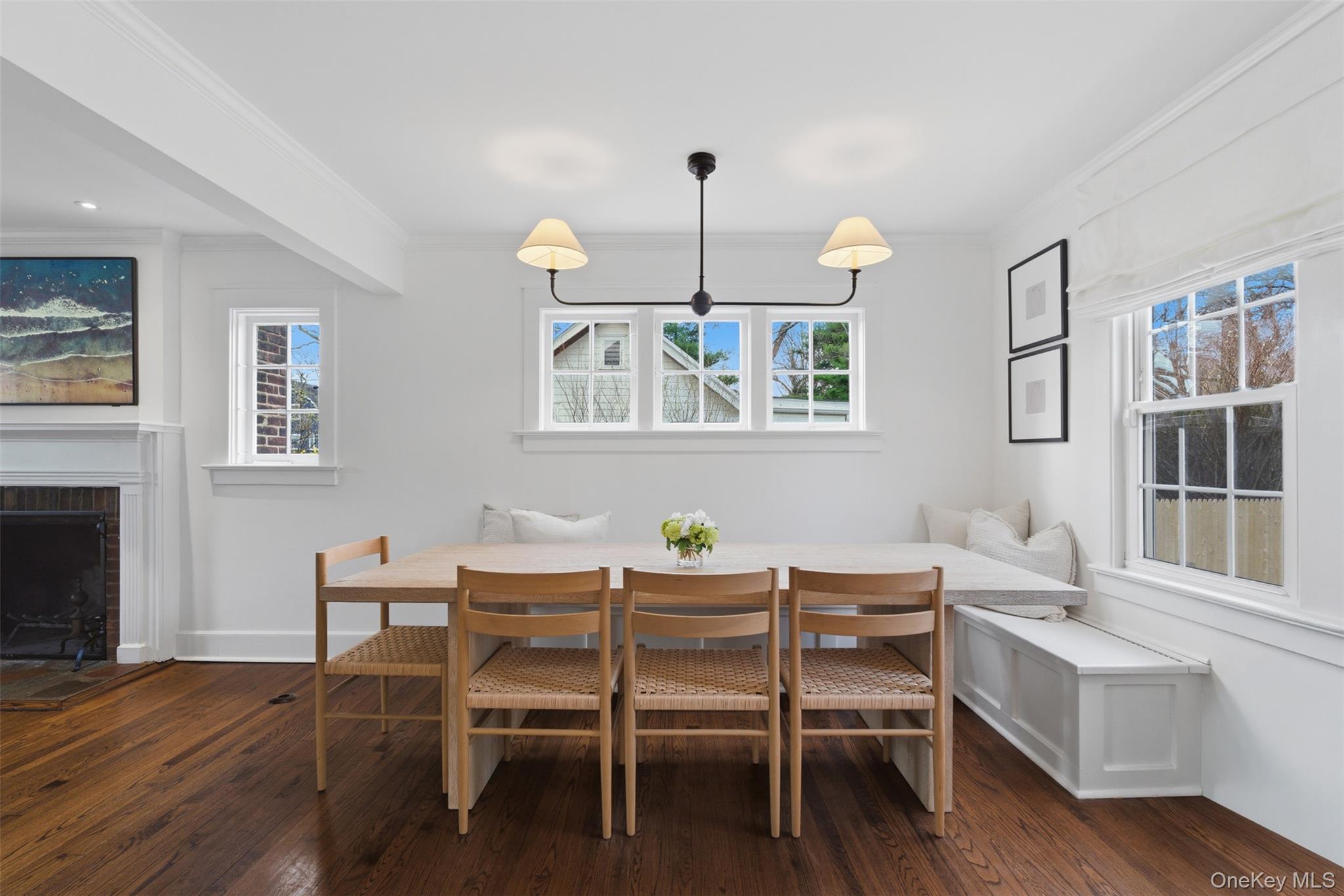 32 Kingsbury Road New Rochelle, NY 10804 - Photo 7 of 31 a dining room with furniture a chandelier and wooden floor